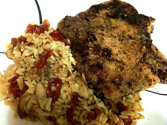 Herb Baked Pork Chop with Sundried Tomato, Slivered Almonds and Garlic Rice Pilaf|Monina Baronganさん