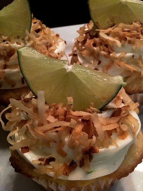 vanilla cupcakes with key lime custard topped with lime zest vanilla cream cheese frosting and toasted coconut|Monina Baronganさん