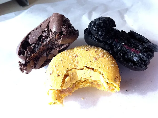 Snapdishの料理写真:Note the black one has a berry filling. All are gorgeously textured. Light shells & chewy in the middle.|Laurenさん