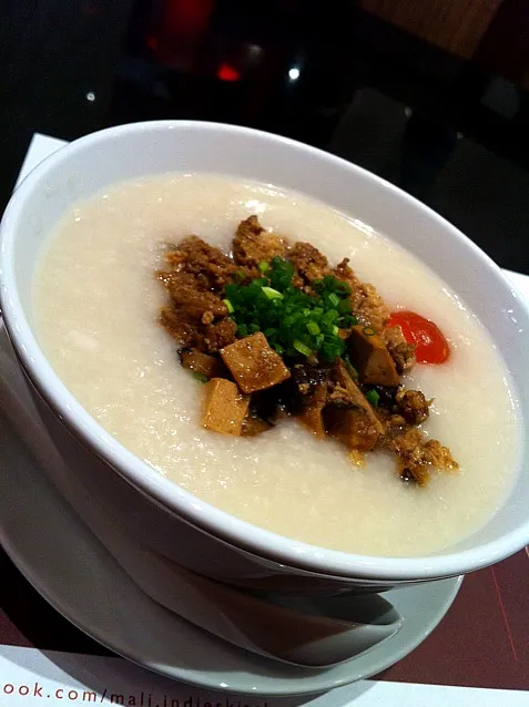 Spotted August 03, 2011 Congee With Stir Fried Pork, Tofu And Salted Egg|about.me/pinku_nekoさん