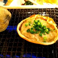 Snapdishの料理写真:カニみその甲羅焼き|おばた しげのぶさん