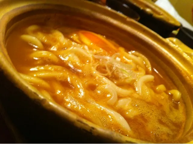 Snapdishの料理写真:煮込みカレーうどん。あつあつ。|たけうちさん