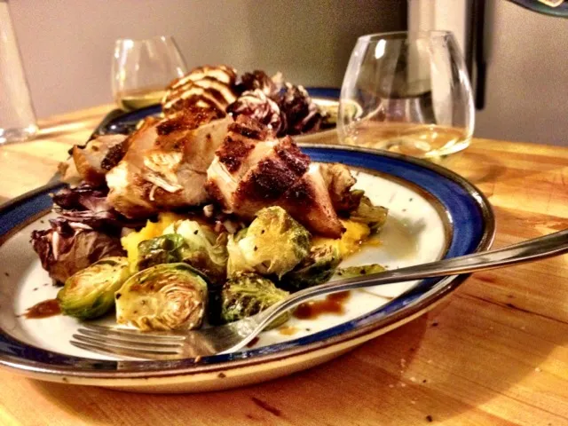 pan seared chicken with squash purée, brussel sprouts, torched radicchio|mathilde goldschmidtさん