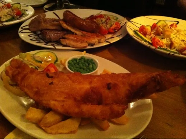 Fish & Chips,Caesar Salad,and Meat plate.|たけうちさん