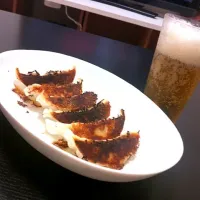 餃子とビール|Kenji Tomitaさん