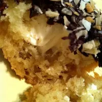 Snapdishの料理写真:coconut cupcake with coconut fillling & chocolate frosting|Carmen Sakuraiさん