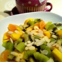 Snapdishの料理写真:Fruit salad with almonds|Tine Putzeysさん