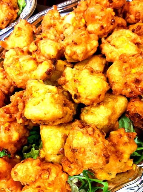 Snapdishの料理写真:corn fritters with peanut sauce from our catering menu|lauren shannonさん