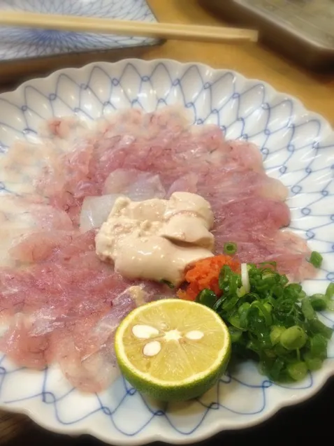 Snapdishの料理写真:皮はぎ薄作り。きもをとかして食べましょう（＾∇＾）|しーさん