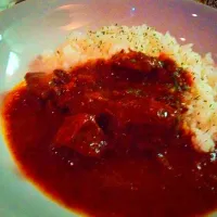 Snapdishの料理写真:マトンカレーハーフ、流石に一口食べただけ！|keigo nakajimaさん