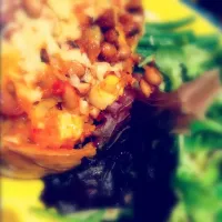 Snapdishの料理写真:roasted stuffed butternut squash with beans and salad|isabel alderson blenchさん