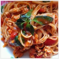 Spaghetti in tomato sauce with pork.|nichapaさん