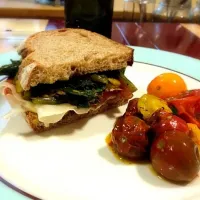 prosciutto and sauteed beet greens sandwich with smoked mozzarella and side of roasted heirloom tomatoes|vikki rubensさん