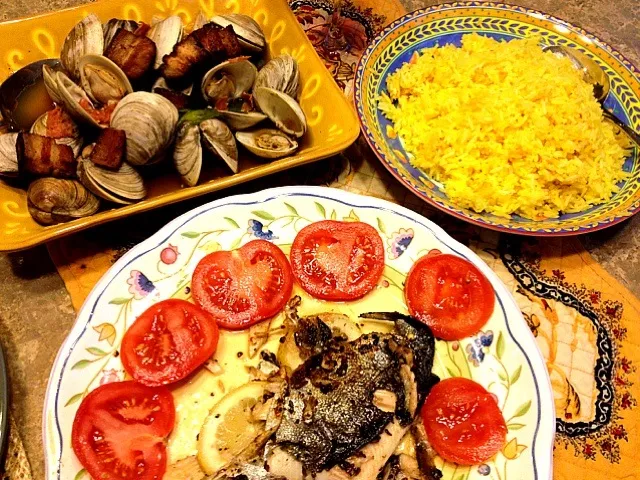 Pan fried trout, clams with chiorizo & pork belly, saffron rice|Tracyさん