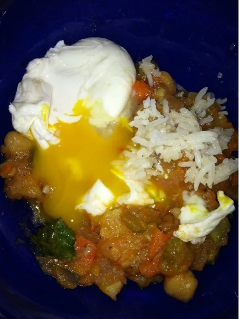 Snapdishの料理写真:leftover ratatouille rice and poached egg|Celine Cossou-Bordesさん