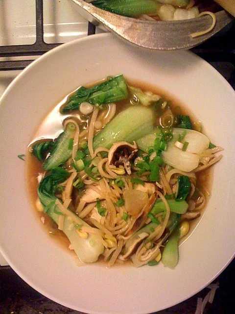 Udon noodle soup with baby bok choy, sprouts, shiitakes & poached egg|xuedan wangさん