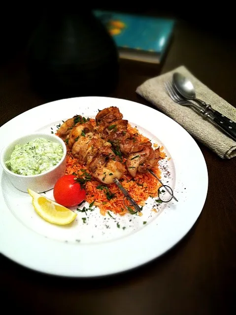 chicken kebab with zataar,tomato pilaf,cucumber and yogurt salad with dill.|rick chanさん