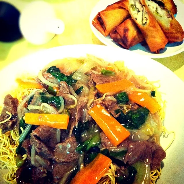 beef with organic veggies over crispy egg noodle / spring roll|tayukoさん