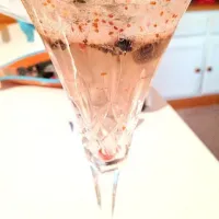 Snapdishの料理写真:Muddled blueberries, St. Germain, Absolute Mango topped with prosecco|Meredith Carltonさん