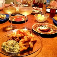 Fresh fried catfish and oysters., oysters Madeleine and Caprese salad.|kendra accardoさん