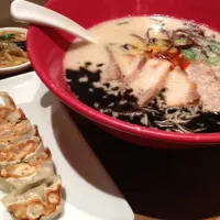 Snapdishの料理写真:Ippudou ramen - akamaru bowl with gyoza, and a side dish of moyashi.|Gigiさん