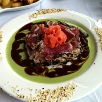 Snapdishの料理写真:Tuna sashimi in wasabi with seasame|Gina Lynnさん