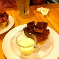 Bread and butter pudding with vanilla sauce