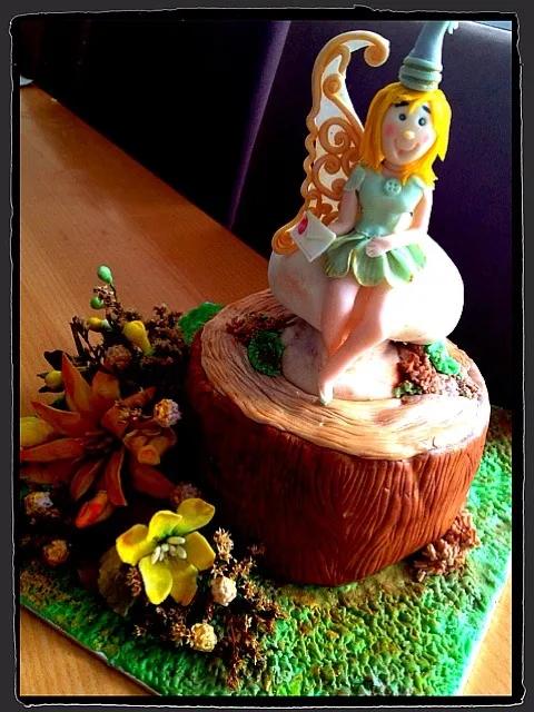 tinkerbell cake after one wing was eaten|shafiyaさん