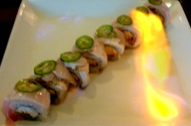 Snapdishの料理写真:Hot Mama #Roll - #California Roll with #Yellowtail, Jalapeno, and Bourbon Torched|sooprcoolchicaさん