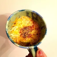 Snapdishの料理写真:microwave eggs with mexican mix cheese, red pepper, and black pepper.|Katelynn Smithさん