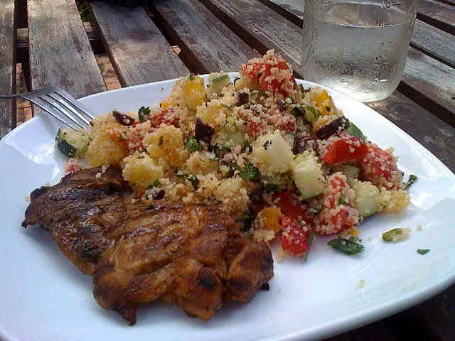 Moroccan-spiced chicken + couscous tabbouleh with olives, dried apricots + local tomatoes + cucumbers @localmattersorg|xuedan wangさん