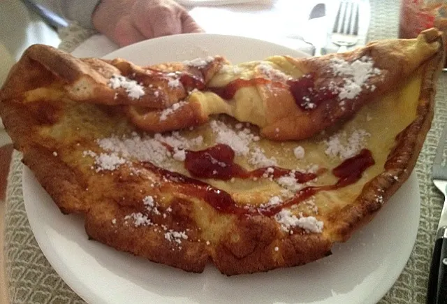 Snapdishの料理写真:Dutch baby pancake with strawberry rhubarb jam and powdered sugar|Dean M Rogersさん