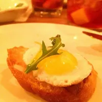 Quail egg and chorizo on toast|Ashley Rhodesさん