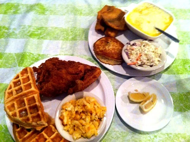 Chicken and Waffles, fried fish and grits, mac n' cheese and slaw.|michael goeさん