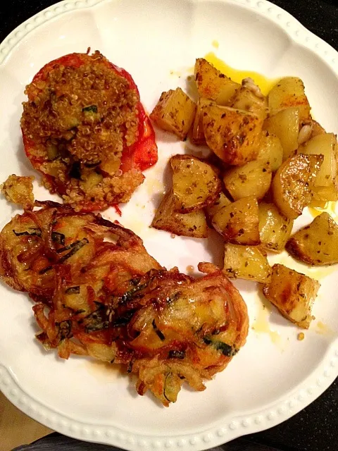 Quinoa stuffed roasted tomatoes, Greek potatoes, and fried bird's nest from Trader Joe's.|Anneさん