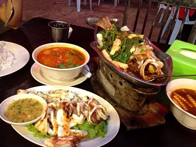 Thai dinner - grilled squid , tom yum kung and steamed fish|(=^x^=)さん