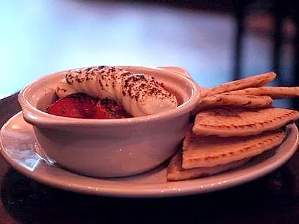 Herb roasted tomatoes and goat cheese mousse brûlée with toasted pita|valintinus domingoさん