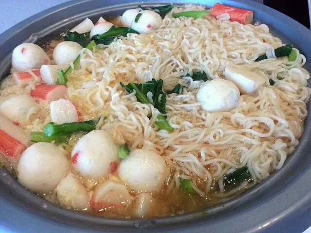 Maggie mee with fish ball, caixin, crab stick, egg and enoki mushroom|sim siew yingさん