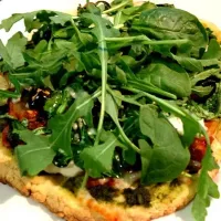 Snapdishの料理写真:Homemade crust with pesto, ricotta, asiago, mozzarella, mushrooms, onions, tomatoes, kalamata olives, spinach and arugula.|summerさん