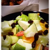 Snapdishの料理写真:Apple and celery salad with yogurt mayo dressing and rum-soaked raisin|Evelyn Chiuさん