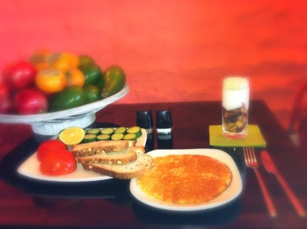 carrots omelette and vegetables with whole bread & muesli(:|shay omradさん