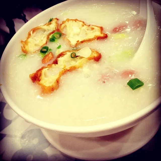 Snapdishの料理写真:Mince pork congee with peanut and youtiao . Must eat while in HK|Mさん