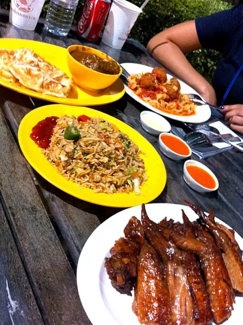 Prata, nasi goreng, BBQ chicken wings and western tomato pasta with meatballs|maria katrina valenciaさん