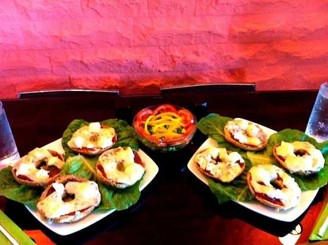 four types of cheese Toast on a pepper sauce and cucumber tomato and yellow pepper salad|shay omradさん