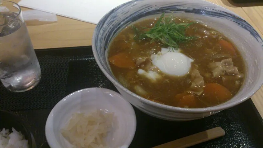 Snapdishの料理写真:カレーうどんの温玉トッピング。温玉の黄身が|SATOSHI OOCHIさん