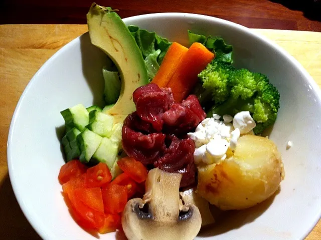 Dinner for our dog Angus : raw beef filet, boiled mushrooms n broccoli, oven potato, cucumber, tomato, avocado, salad, cottage cheese|keiko mashimaさん