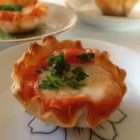 Snapdishの料理写真:Tartaletas de romesco y queso de cabra.|veronica cerveraさん