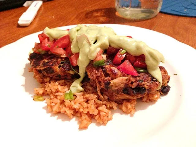 Chicken & Black Bean Croquettes topped with Pico De Gallo and an Avocado Cream sauce on a bed of Spanish Rice|Phyliciaさん