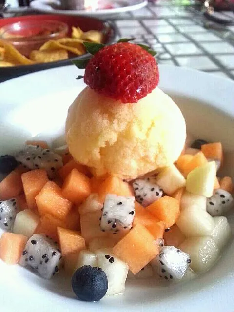 passionfruit sorbet on medley of fruits|Tinky 🍒さん