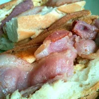 Bacon and eggs in baguette.|Rachelさん